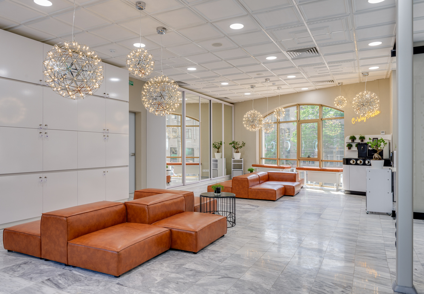 Brown Couch on Marble Floor